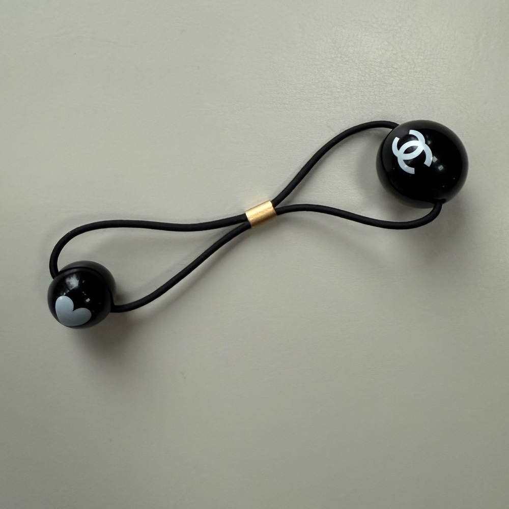 CHANEL Black and Gold Logo Hair Accessory